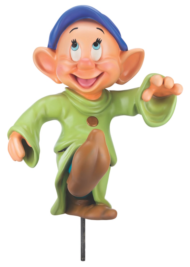 A Dopey Display Figure from the Disney Store.: (Disney Store, 1995) A Disney Store display figure of Dopey from "Snow White and the Seven Dwarfs." Measuring 18" x 23" x 34" tall, the fiberglass display is in very good condition with typical wear