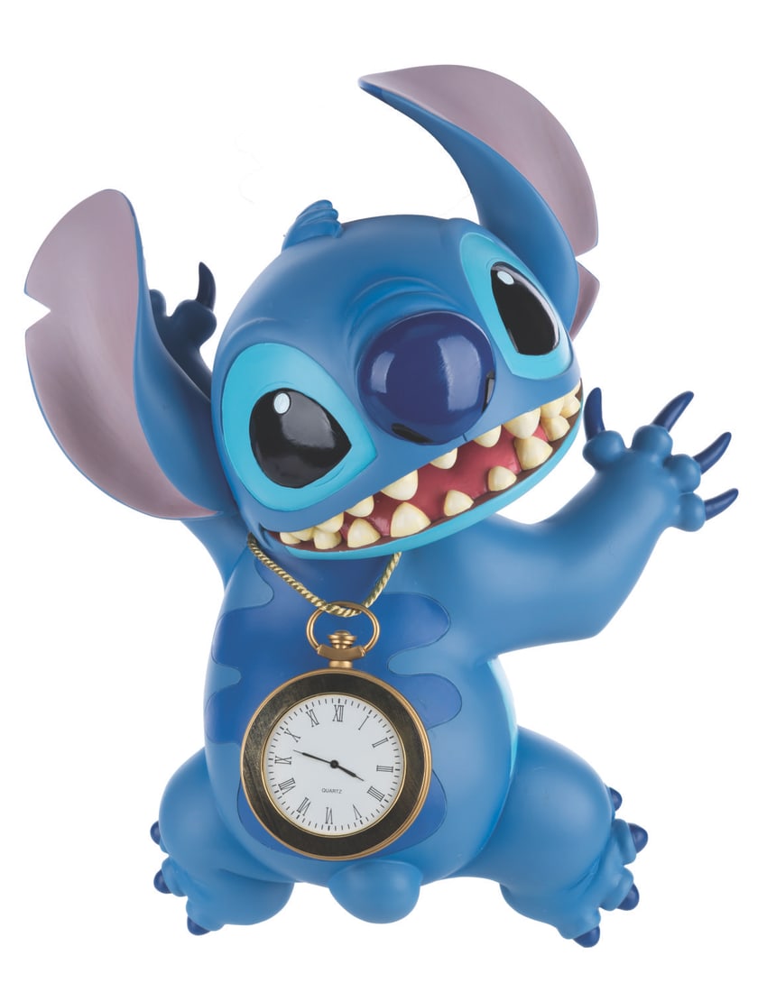 A Disney Auctions Stitch Wall Clock.: (Disney, 2000s) A rare Disney Auctions wall clock of Stitch from "Lilo and Stitch," released in an edition of only 150. The clock is sold untested and may need a new battery or service to function. Me