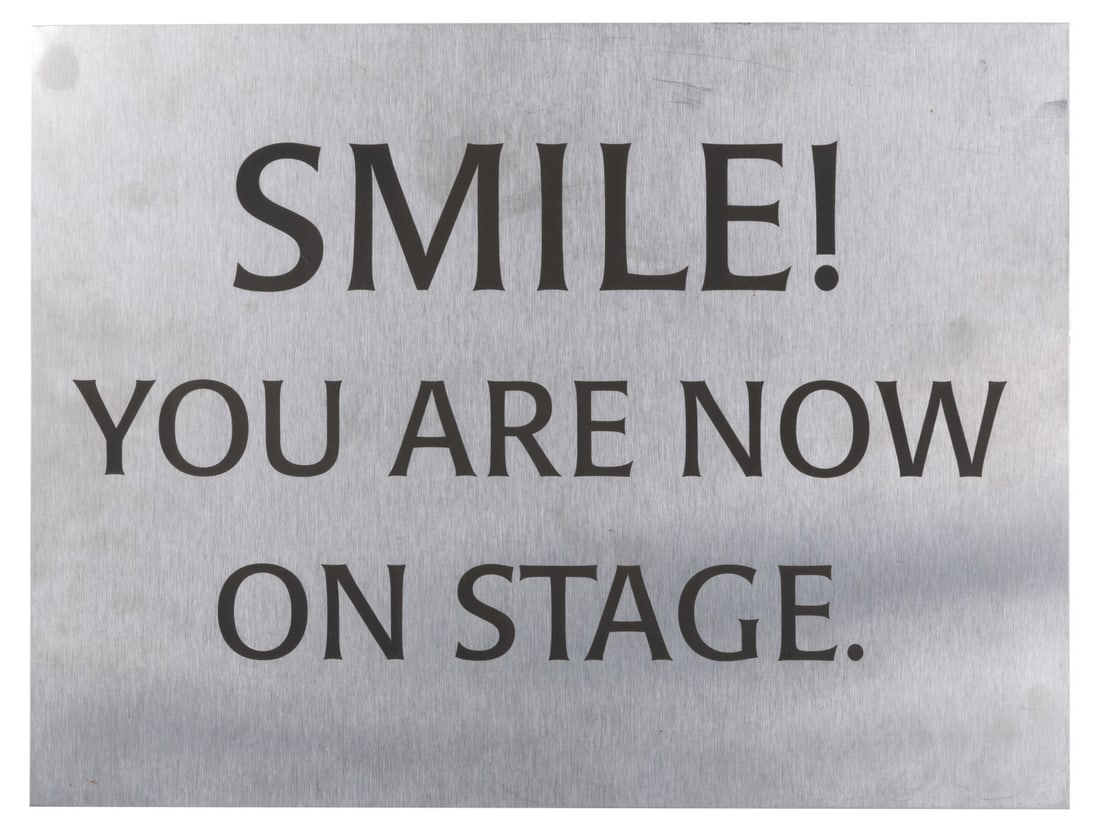A "Smile, You Are Now on Stage" Cast Member Sign. (1 of 1)