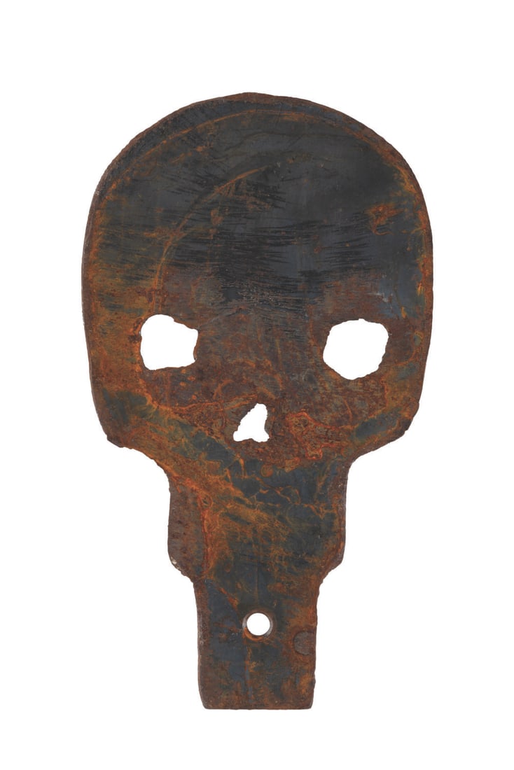 A Big Game Safari Shooting Gallery Skull Target.: (Disneyland, 1962-82) An unpainted metal skull target from the Big Game Safari Shooting Gallery in Adventureland. Made of thick plate steel, the targets would make a satisfying "ping" when hit by the 