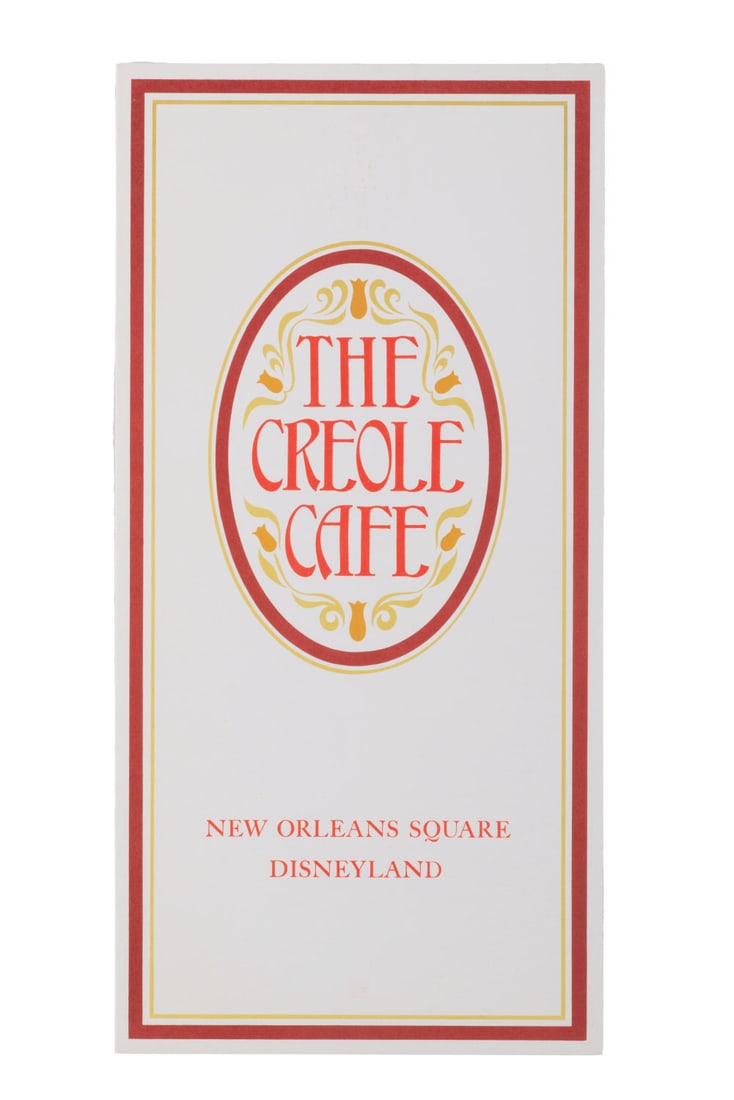 A 1966 Creole Cafe Menu.: (Disneyland, 1966) An early menu from The Creole Cafe in New Orleans Square. The restaurant, now called Cafe Orleans, is famous for its Monte Cristo sandwich. Measuring 7" x 14," the menu is in very g