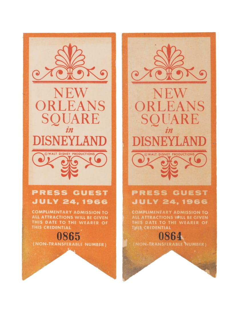 A Pair of New Orleans Square Opening Press Passes.: (Disneyland, 1966) Two press passes to the opening ceremony for New Orleans Square in Disneyland, on July 24, 1966. This event was the last major public appearance for Walt Disney, who appeared alongs