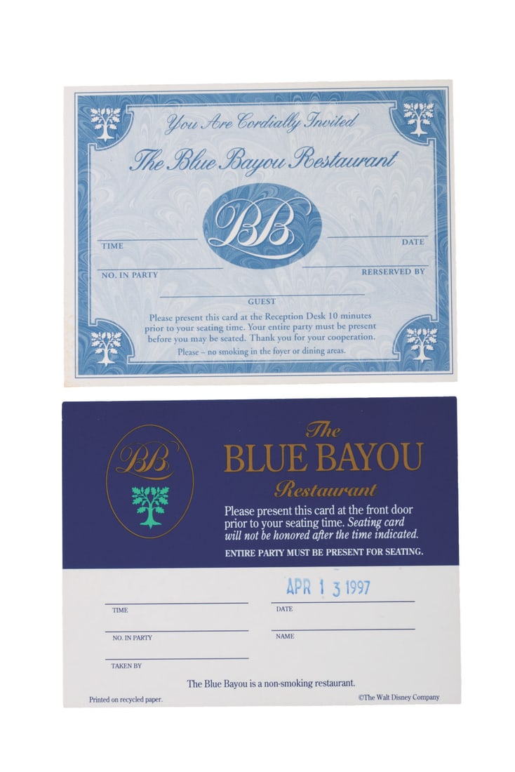 A Pair of Blue Bayou Restaurant Reservation Cards.: (Disneyland, 1990s) Two styles of reservation cards to Disneyland's Blue Bayou restaurant. One card is stamped with the date Apr 13, 1997, while the remaining info is left blank. The cards measure