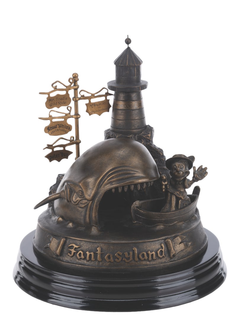 A Fantasyland 50th Anniversary Figurine by Larry Nikolai.: (Disneyland, 2005) A Fantasyland figurine designed by Larry Nikolai and sculpted by Theresa Miller, released for Disneyland's 50th anniversary. This Disneyland Artist Figurine Series piece features