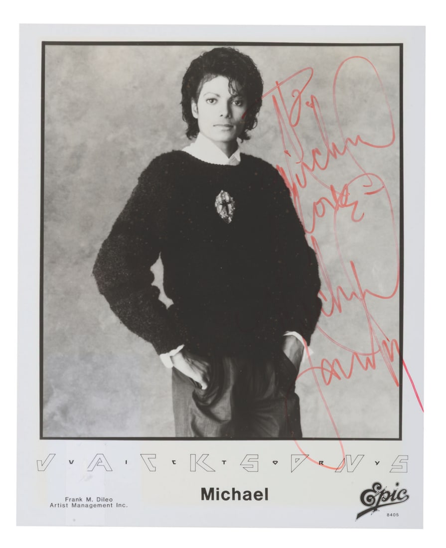 A Captain EO Photo Signed by Michael Jackson. (1 of 2)