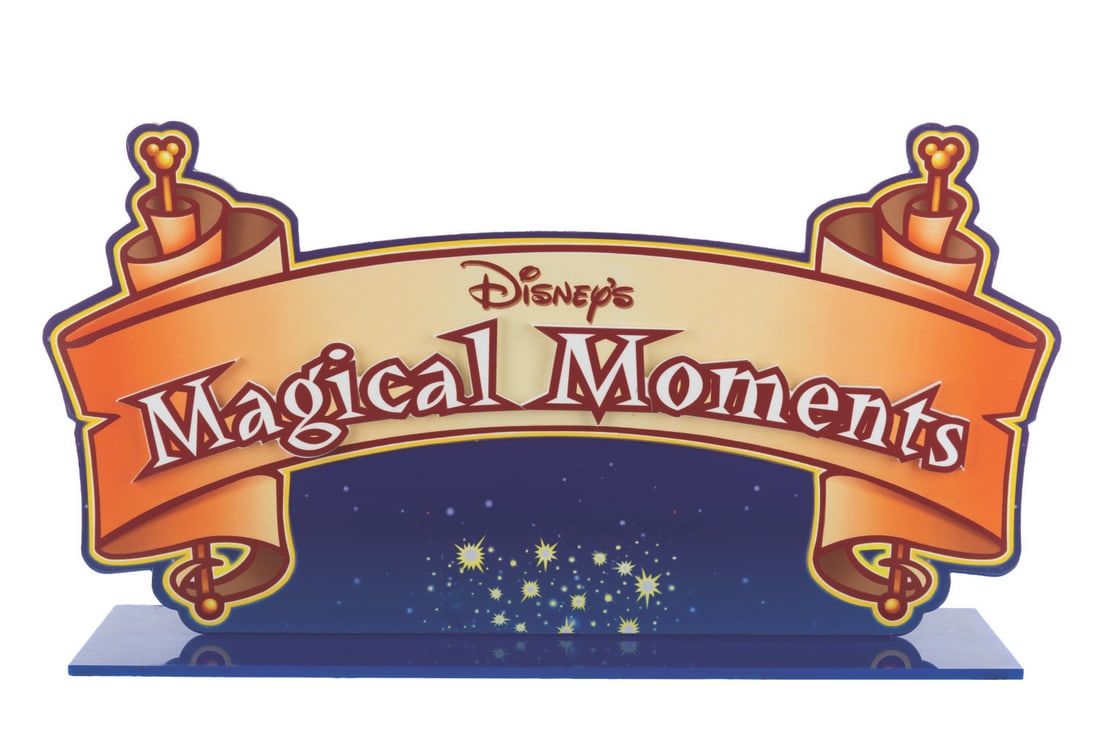 A Disney's Magical Moments Countertop Display.: (Walt Disney World, 2001) A store countertop display for the Disney's Magical Moments line of pins, released for the 100 Years of Magic celebration of Walt's birth. Measuring 20" x 5" x 12" tall, the