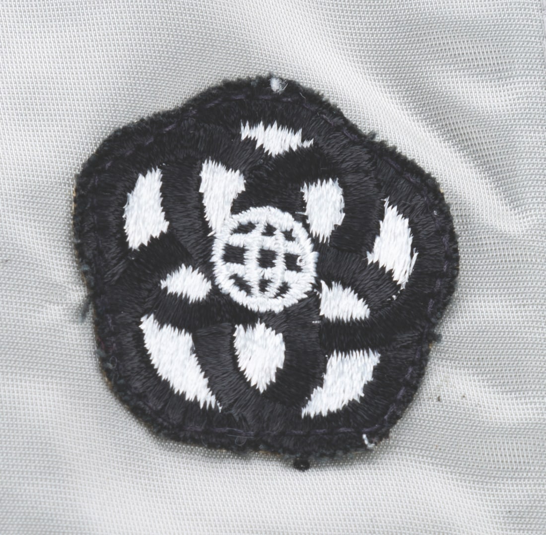 An EPCOT Center Silver Cast Member Jacket. - 2