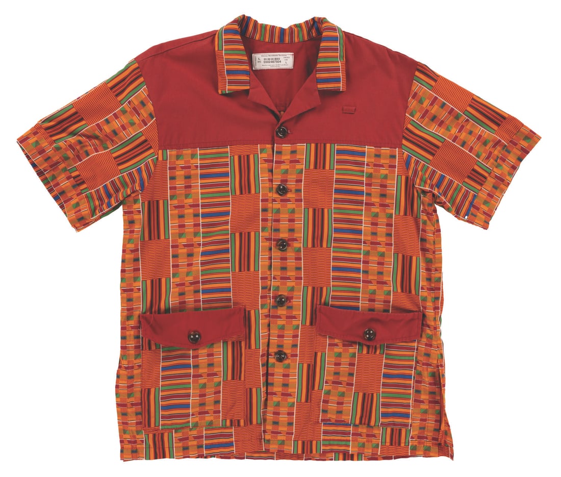A Disney's Animal Kingdom Cast Member Shirt. (1 of 2)