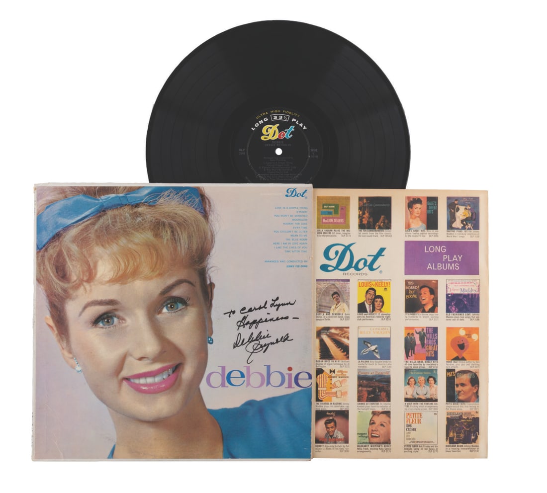 A Debbie Reynolds Signed "Debbie" LP Record Album.: (Dot, 1959) An original U.S. release LP of "Debbie," signed with a dedication by artist Debbie Reynolds. The album and sleeve are in very good condition, with light fading, scuffs, and small creases