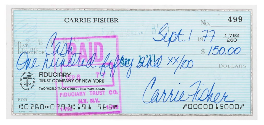 A Carrie Fisher Signed Check.: (Fisher, 1977) A personal check boldly signed on the front and back by actress Carrie Fisher. Dated September 1st, 1977, the check is just over four months after the first "Star Wars" film opened and