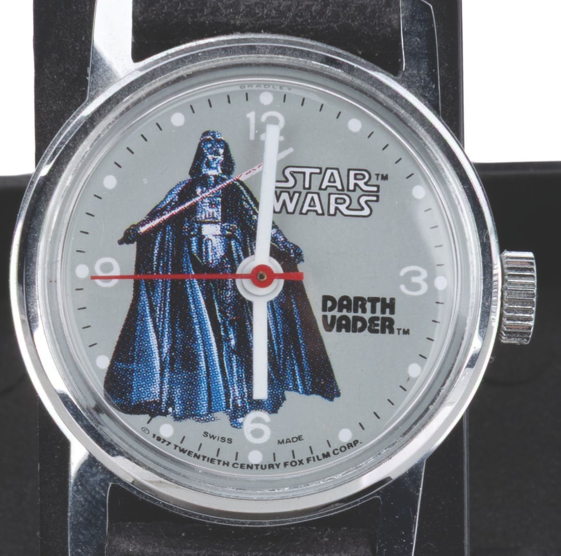 A "Star Wars" Darth Vader Wristwatch.: (Bradley, 1977) An early "Star Wars" watch featuring Darth Vader on the face. The watch did not work when tested, likely requiring repair or a new battery. The watch is in very good condition with