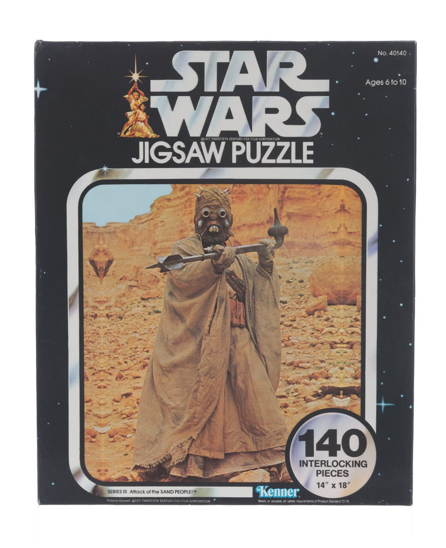 A Sealed "Star Wars" Jigsaw Puzzle.: (Kenner, 1978) A sealed “Star Wars” jigsaw puzzle of a Tusken Raider. Measuring 14” x 18” when completed, the 140-piece puzzle is in presumed fine condition in the original very