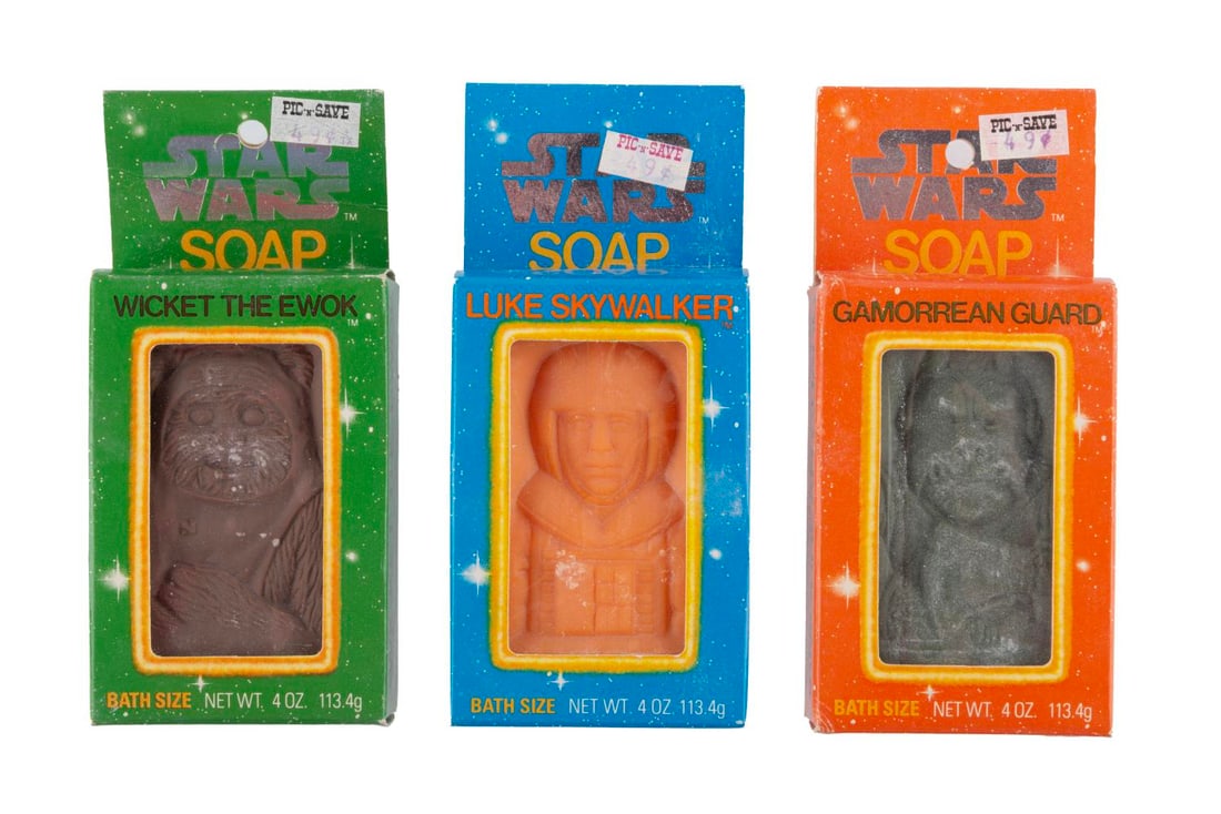 Three Star Wars "Return of the Jedi" Soaps.: (Omni Cosmetics, 1983) Three Star Wars "Return of the Jedi" soaps, including bath-size bars of Luke Skywalker, Wicket the Ewok, and the Gamorrean Guard. Measuring 2.5" x 5.5", the boxed soaps are in