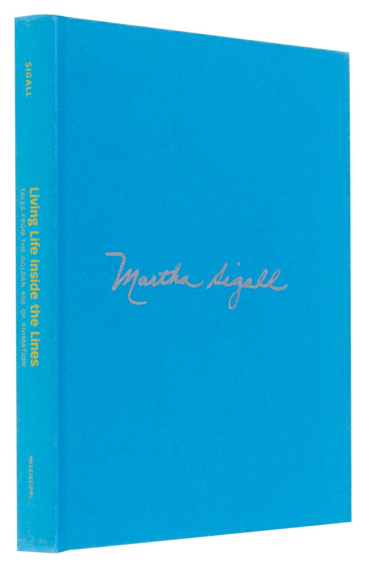 A Signed Living Life Inside the Lines Book.: (Mississippi, 2005) A Living Life Inside the Lines: Tales from the Golden Age of Animation book by inker and painter Martha Sigall, signed on the cover in silver marker. Measuring 6.75" x 8.75", the