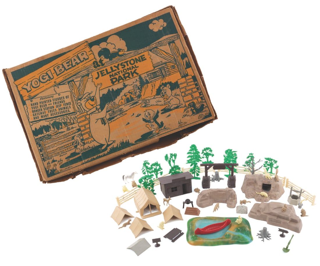 A Yogi Bear at Jellystone National Park Playset.: (Marx, 1962) A rare Yogi Bear at Jellystone National Park playset manufactured by Marx. The set includes the original box and retains many play pieces, including campsites, trees, rocks, animals, and