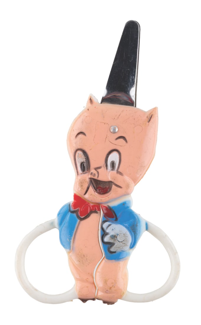A Pair of Porky Pig Scissors.: (Dyno, 1978) A pair of Porky Pig child?s scissors. Measuring 2.75" x 4.75", the scissors are in good condition with wear from use including scuffs and light paint loss.