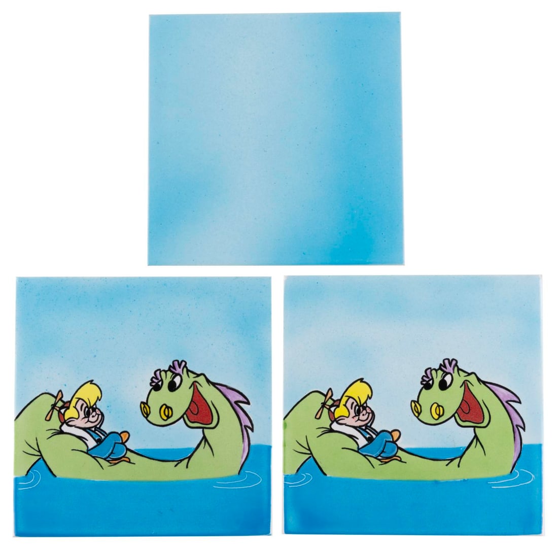 A Pair of Beany and Cecil Production Sample Tiles.: (Clampett, 1990s) A pair of decorative tiles of Beany and Cecil. These were samples made for a potential merchandise item. Also includes in one matching plain blue tile. Measuring 6" x 6", the tiles