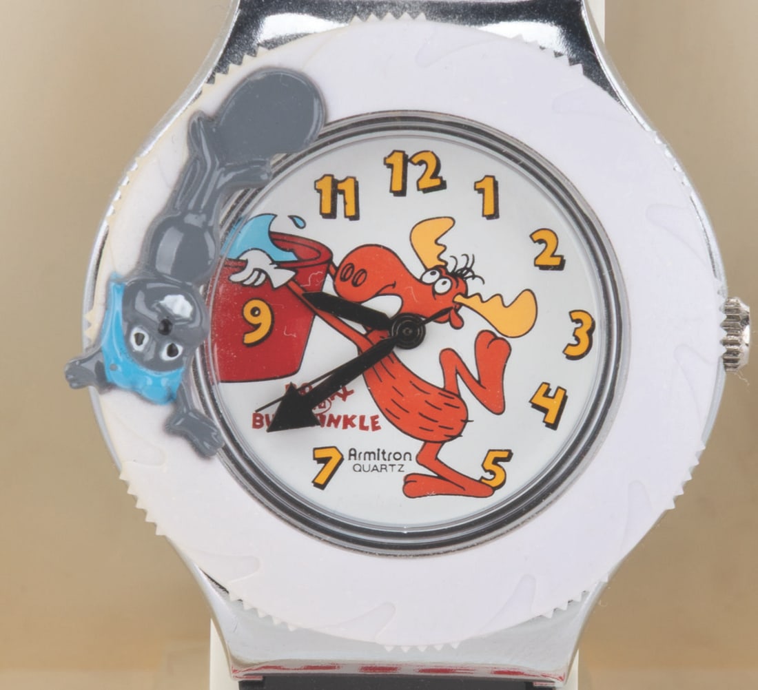 A Rocky and Bullwinkle Quartz Wristwatch.: (Armitron, 1990s) A Rocky and Bullwinkle wristwatch manufactured by Armitron. The watch did not work when tested, likely requiring service or a new battery. The watch displays in very good condition