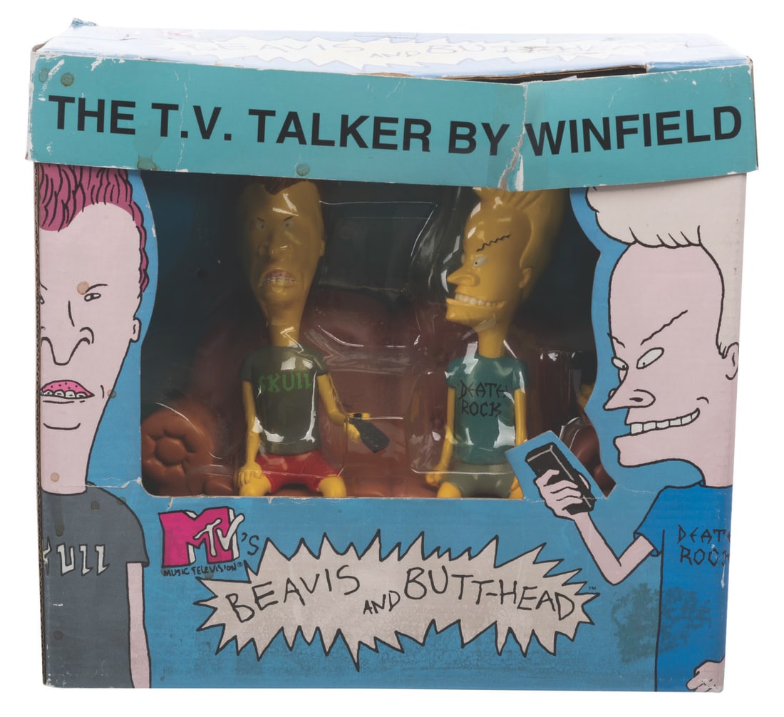 A Beavis and Butt-Head TV Talker Toy.: (MTV/Winfield, 1996) A Beavis and Butthead TV Talker toy in the original box. With four "AAA" batteries (not included), the pair and their iconic couch are designed to sit atop your television set