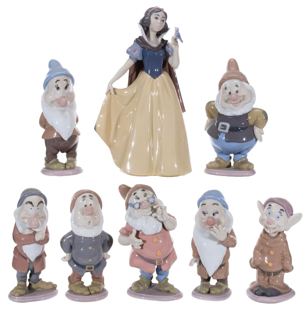 A Lladro "Snow White and the Seven Dwarfs" Figurine Set. (1 of 4)