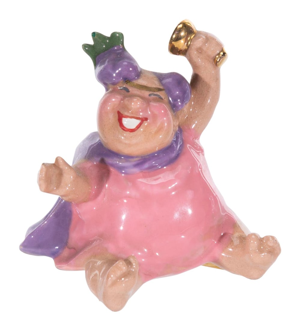 A 1950s Bacchus "Fantasia" Ceramic Figurine.: (Hagen-Renaker, 1950s) A ceramic figurine of Bacchus from the Pastoral Symphony sequence of "Fantasia," released by Hagen Renaker. Measuring 1.75" tall, the ceramic displays in very good condition wit