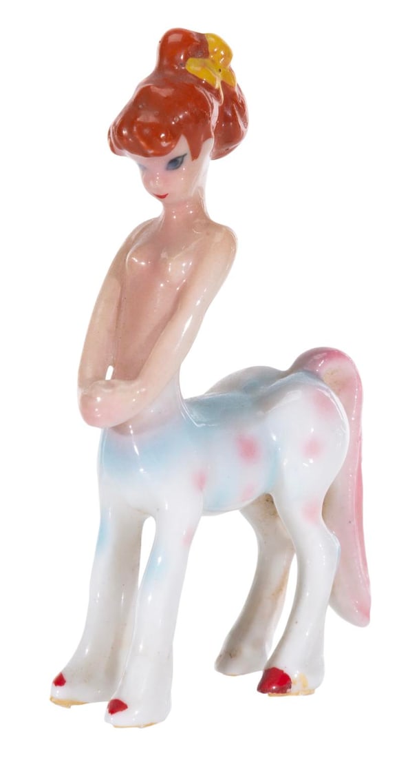 A "Fantasia" Centaurette Ceramic Figurine.: (Disney, 1950s-60s) A miniature ceramic figurine of a Centaurette from the Pastoral Symphony sequence of "Fantasia," made of bone china. Measuring 2.5" tall, the ceramic is in very good condition with