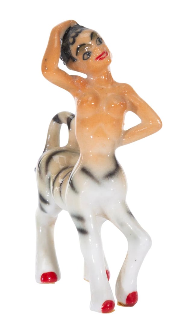 A "Fantasia" Centaurette Ceramic Figurine.: (Disney, 1950s-60s) A miniature ceramic figurine of a Centaurette from the Pastoral Symphony sequence of "Fantasia," made of bone china. Measuring 2.25" tall, the ceramic is in very good condition wit