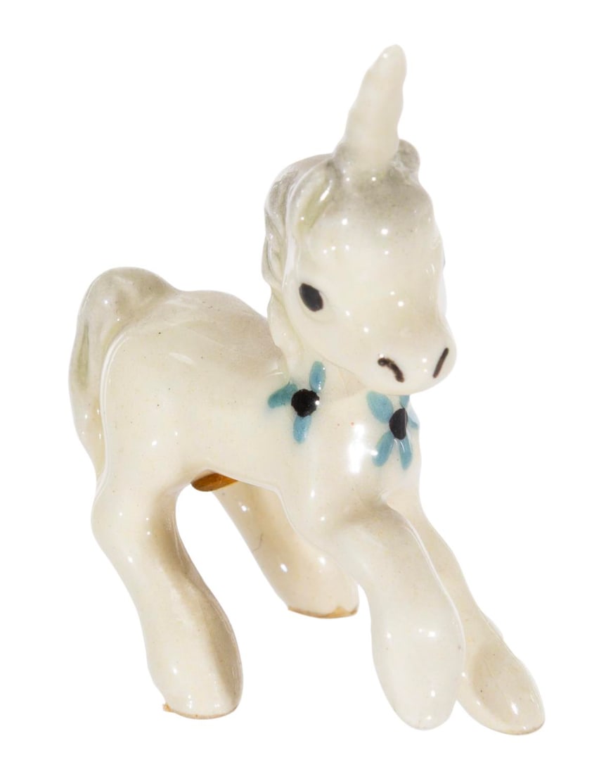A Hagen-Renaker Unicorn Baby Ceramic Figurine.: (Hagen-Renaker, 1970s) A miniature white baby unicorn figurine created by Hagen-Renaker. Measuring 2" tall, the ceramic displays in very good condition with crazing and tape on the bottom.