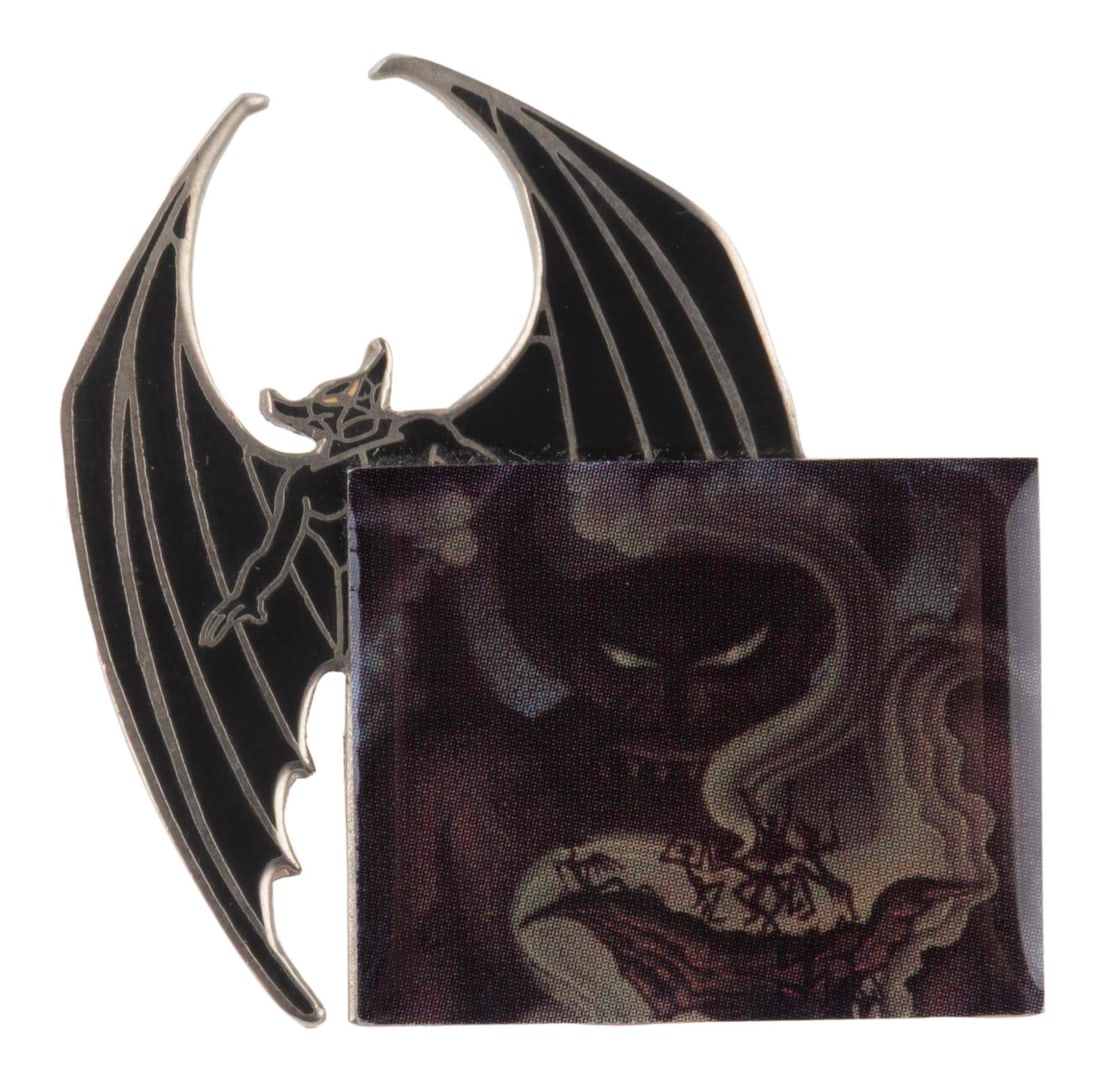 A Disney Catalog Chernabog Portrait Pin.: (Disney Catalog, 2002) A Chernabog with concept art pin, released in a "Villains Boxed" limited edition 5000 set by the Disney Catalog. Measuring 1.75" x 1.75", the pin is in very good condition.