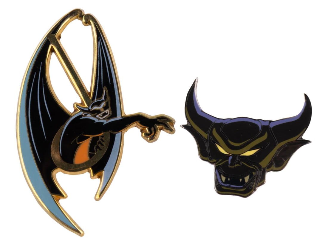 A Pair of Disney Catalog Exclusive Chernabog Pins.: (Disney Catalog, 2002/2005) A pair of Disney Catalog Exclusive Chernabog pins. The face pin was a gift with purchase pin with the 2002 Villains Pin Bag, and the "reaching" pin was only available in th