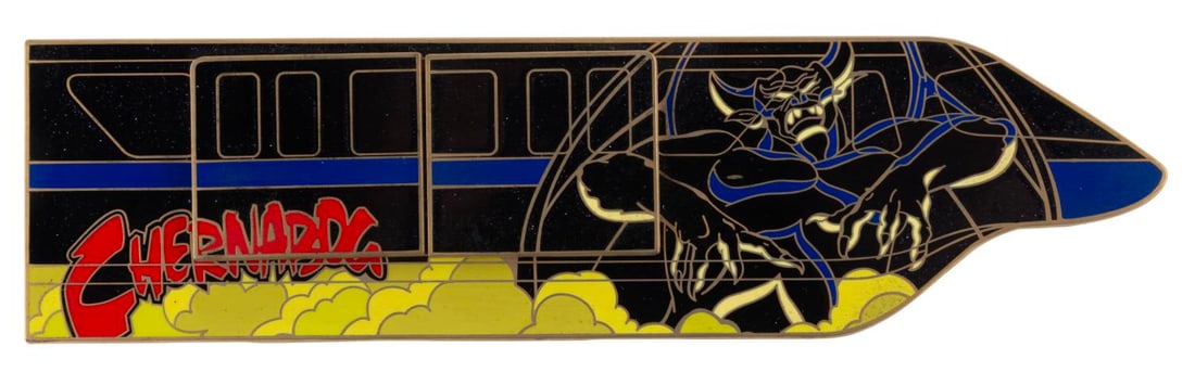 A Jumbo Magical Monorail Chernabog Pin.: (Walt Disney World, 2008) A Chernabog jumbo pin from the Magical Monorail Collection released in a limited edition of 750 at Walt Disney World. The pin features sliding doors that reveal a pin-on-pin 