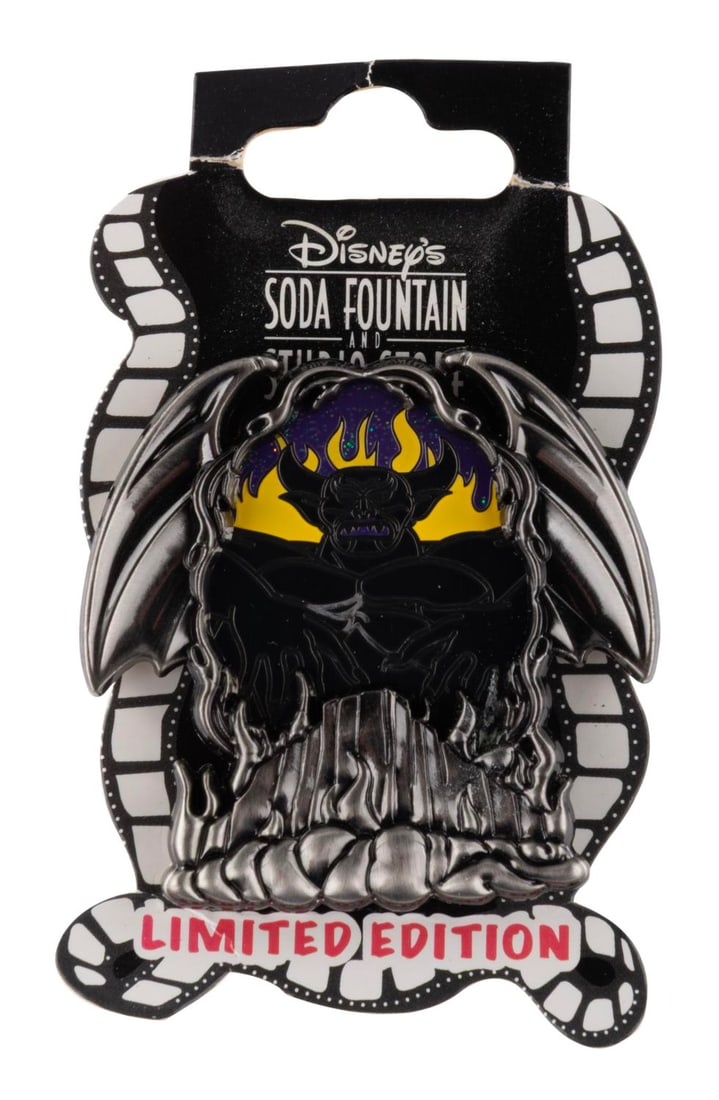 A Studio Store Hollywood Villain Frames Chernabog Pin.: (Disney, 2011) A Chernabog pin from the Villain Frames series, released exclusively at the Disney Studio Store and Soda Fountain in Hollywood. The limited edition 300 pin is in fine condition on the
