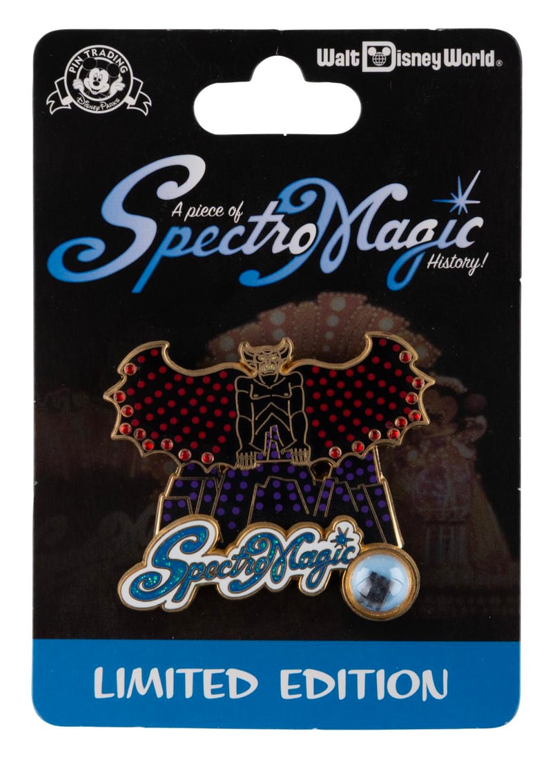 A Chernabog SpectroMagic Parade Pin.: (Walt Disney World, 2014) A Chernabog pin from the Piece of SpectroMagic History series released in a limited edition of 2500 from Walt Disney World. The pin contains an actual piece of scrim from