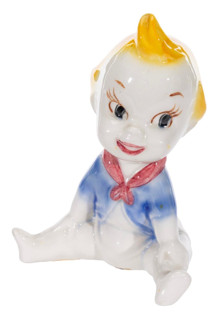 A Vernon Kilns Baby Weems Ceramic Figurine.: (Vernon Kilns, 1941) An original Baby Weems ceramic figurine manufactured by Vernon Kilns. The character was first popularized by its namesake short introduced within the 1940 package film "The Reluct