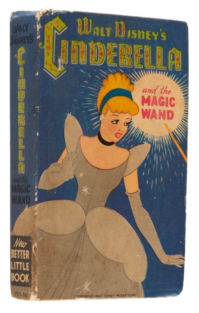 A Walt Disney's Cinderella and the Magic Wand Book.: (Whitman, 1950) A Better Little Book of Cinderella and the Magic Wand. Measuring 3.25" x 5.5", the book displays in good condition with edge wear, spotting, creases, and discoloration from age.