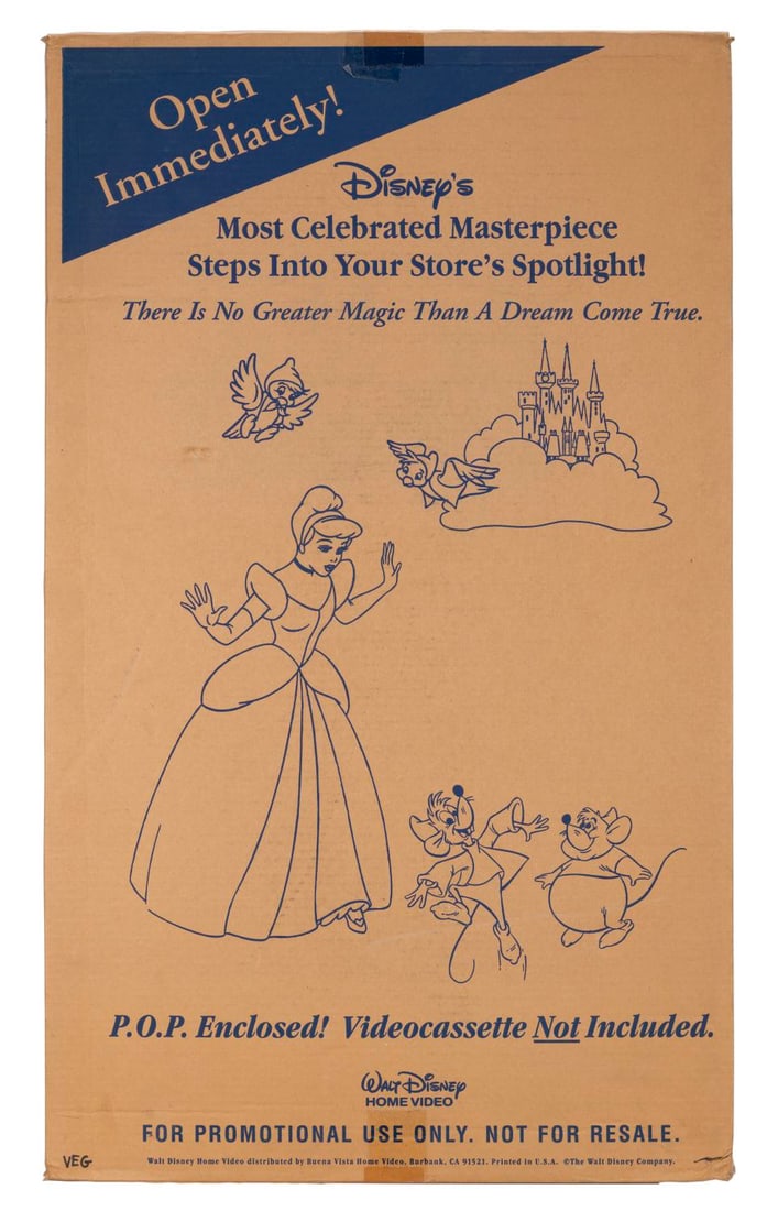 A Cinderella VHS Video Release Store Display.: (Disney, 1990s) A point-of-purchase sale display for "Cinderella" on VHS videocassette, which would stand approximately four to five feet tall. This display has never been assembled, a stock photo is