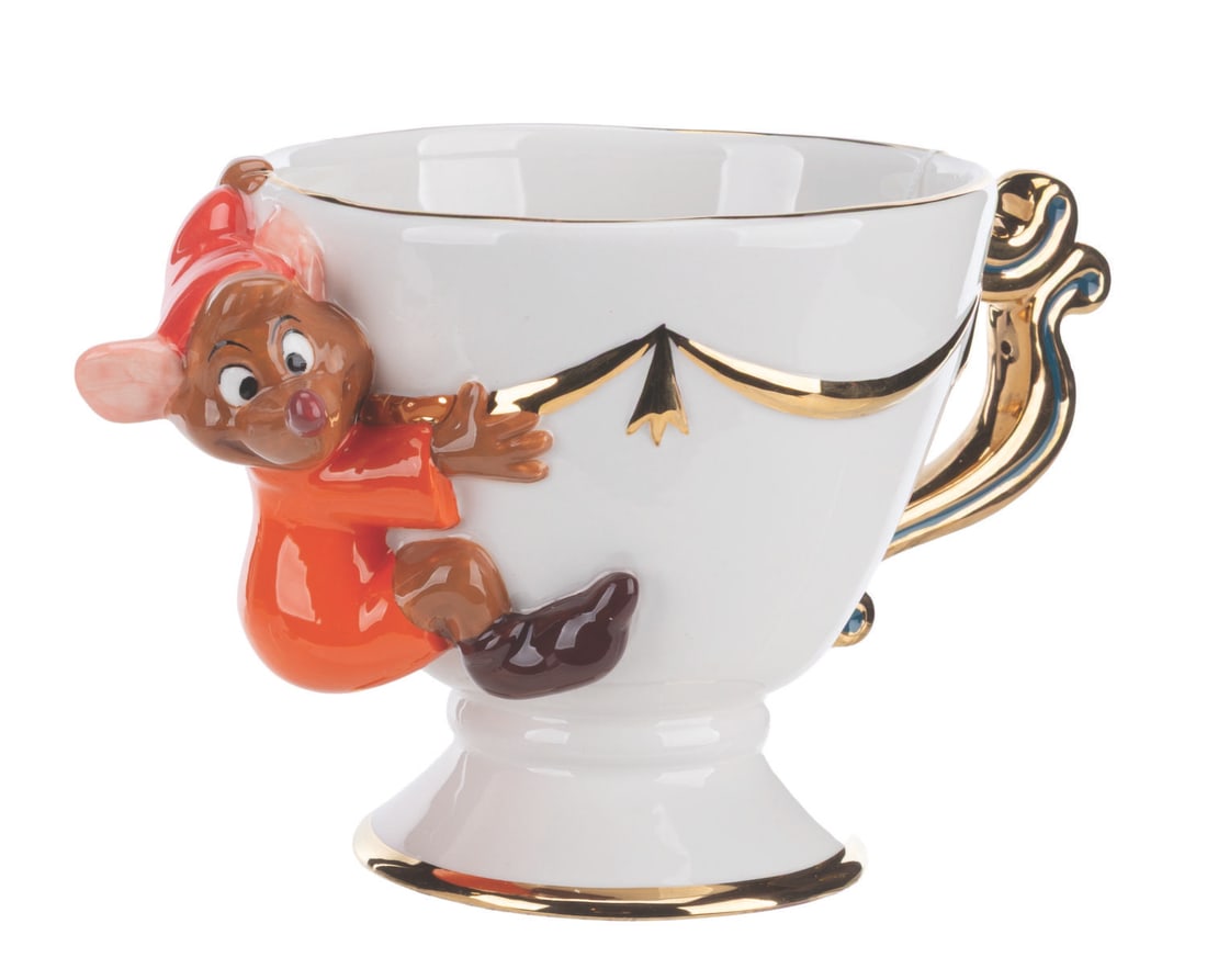 A Jaq Cup and Saucer Set.: (Disney Store, 1990s-2000s) A "Cinderella " Cup and Saucer set with the little mouse Jaq clinging to the cup. The china set is in fine as-new condition.