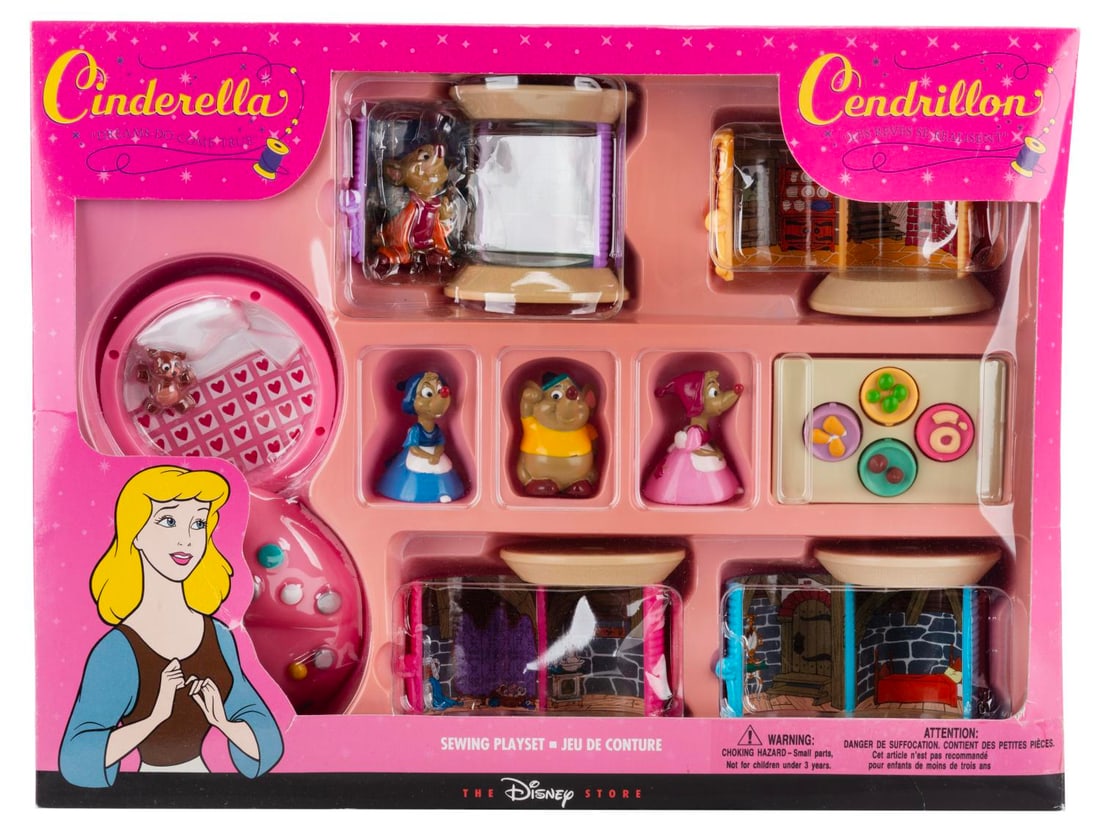 A Cinderella Sewing Playset.: (The Disney Store, 1990s) A "Cinderella" Sewing Playset with Jaq, Gus, Mary and Perla figures, four thread spools that open to reveal miniature scenes from the movie and a pincushion that opens to