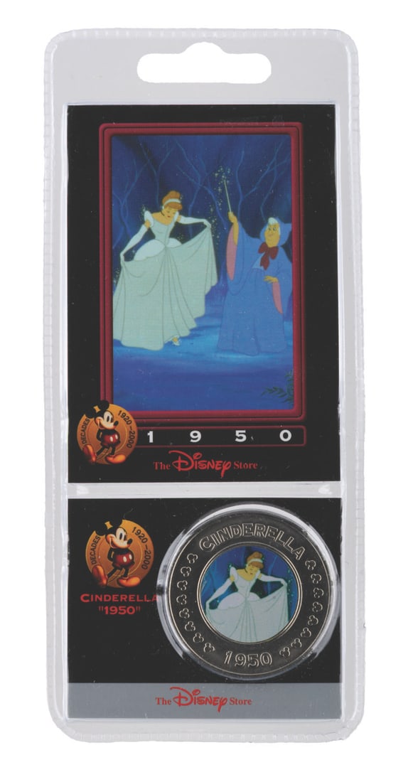 A "Cinderella" Disney Decades Coin and Card Set.: (Disney, 2000) A Disney Decades coin and collector card of 1950?s "Cinderella." The set is in fine condition sealed in the original packaging.