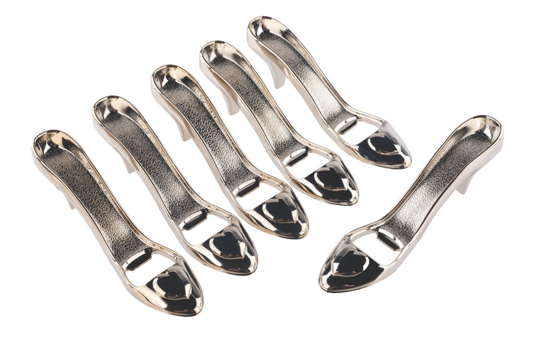 A Set of "Cinderella" Slipper Bottle Openers.: (Disney Shopping, 2000s) A set of six bottle openers, shaped like Cinderella?s slipper. At last, you and your friends can open a six pack all at the same time, with the grace of a Princess. Each