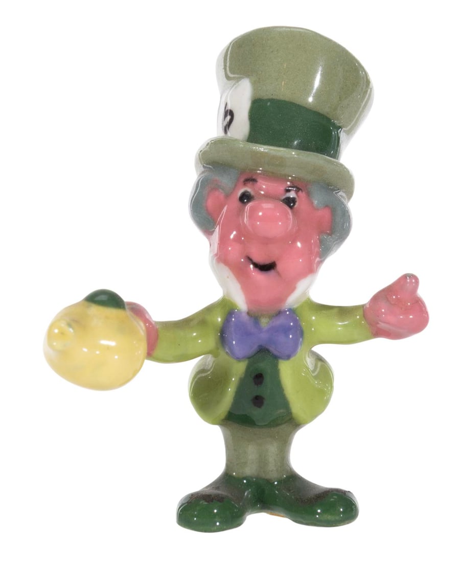 A Mad Hatter "Alice in Wonderland" Ceramic Figurine.: (Hagen-Renaker, 1950s) A rare figurine of the Mad Hatter from "Alice in Wonderland" by renowned Californian ceramist, Hagen Renaker. Measuring 2.25" tall, the ceramic is in very good condition with