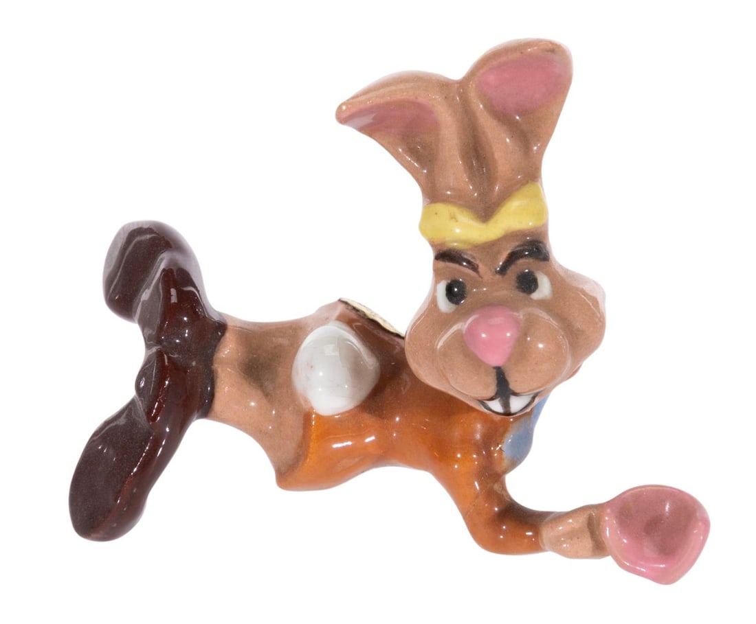 An "Alice in Wonderland" March Hare Figurine.: (Hagen-Renaker, 1950s) A rare figurine of the March Hare from "Alice in Wonderland" by renowned Californian ceramist, Hagen Renaker. Measuring 2" long, the ceramic displays in very good condition