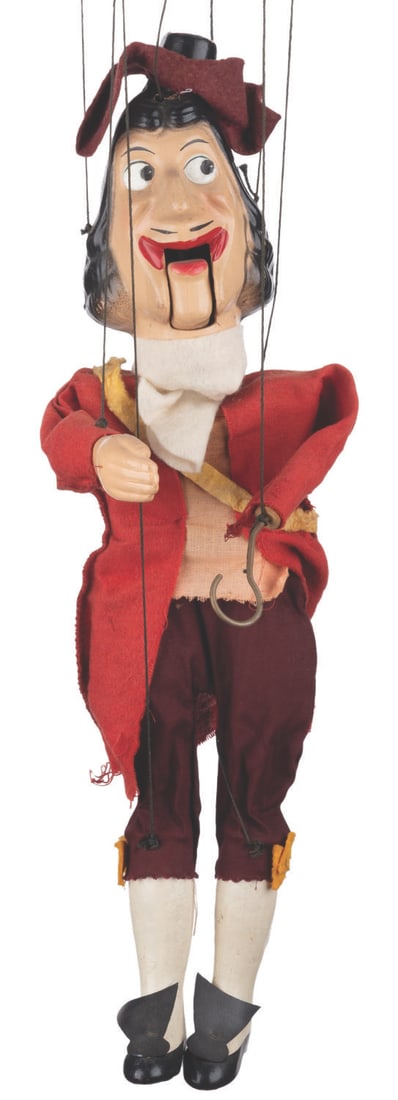 A "Peter Pan" Captain Hook Marionette Puppet.: (Peter Puppet Playthings, 1950s) A marionette of Captain Hook from "Peter Pan." Measuring 17" long with 8" of strings, the puppet is in fair condition with clothes showing much wear from age, and