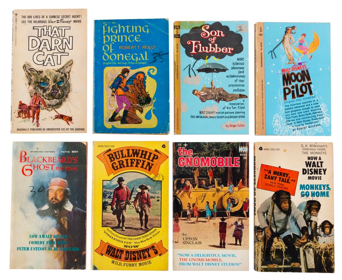 A Set of 1960s Disney Live-Action Paperback Books.: (Various, 1960s) Eight paperback books of live-action films released by Disney in the 1960s. Each is either the original novel the film was based on or an adaptation of the film?s script, all with