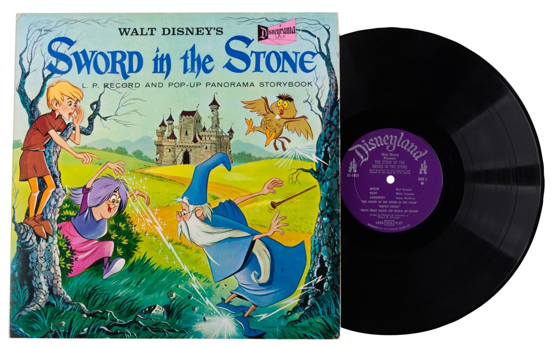 A "Sword in the Stone" Record and Pop-Up Storybook.: (Disneyland Records, 1963) A "Sword in the Stone" record and pop-up panorama storybook. Measuring 12.5" x 12.5", the album is in very good condition with light wear.