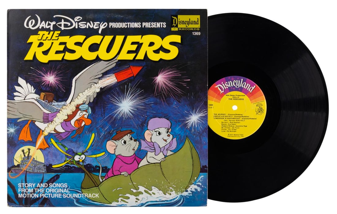 A "The Rescuers" Disneyland Records Album.: (Disneyland Records, 1977) A "The Rescuers" album featuring the story and songs from the original motion picture soundtrack. Measuring 12.5" x 12.5", the album displays in very good condition with