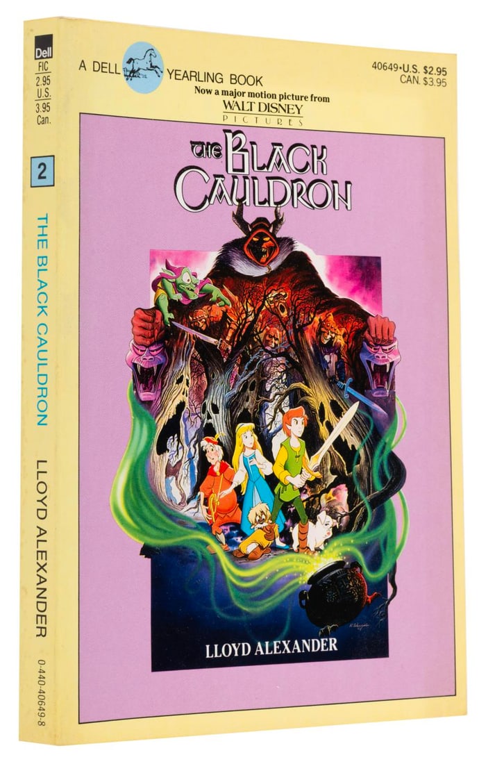 A "The Black Cauldron" Dell Yearling Edition with Disney Cover.: (Dell Yearling, 1985) A softcover edition of Lloyd Alexander?s "The Black Cauldron" featuring the poster art for the Disney film on the cover. Measuring 7.5" x 5", the book is in very good condition