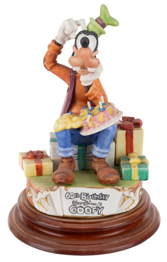 A Goofy 60th Birthday Capodimonte Figurine.: (Capodimonte, 1992) A 60th anniversary figurine of Goofy, released in a limited edition of only 376. Measuring 6.5" in diameter x 9" tall, the figurine displays in very good condition with a 0.5"