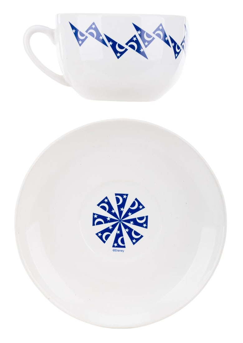 A Disney Feature Animation Building Opening Mug and Saucer Set.: (Disney, 1994) A coffee mug and saucer that was given as a gift to employees when Walt Disney Studios opened the feature animation building in Burbank, California, in 1994. The pattern celebrates the