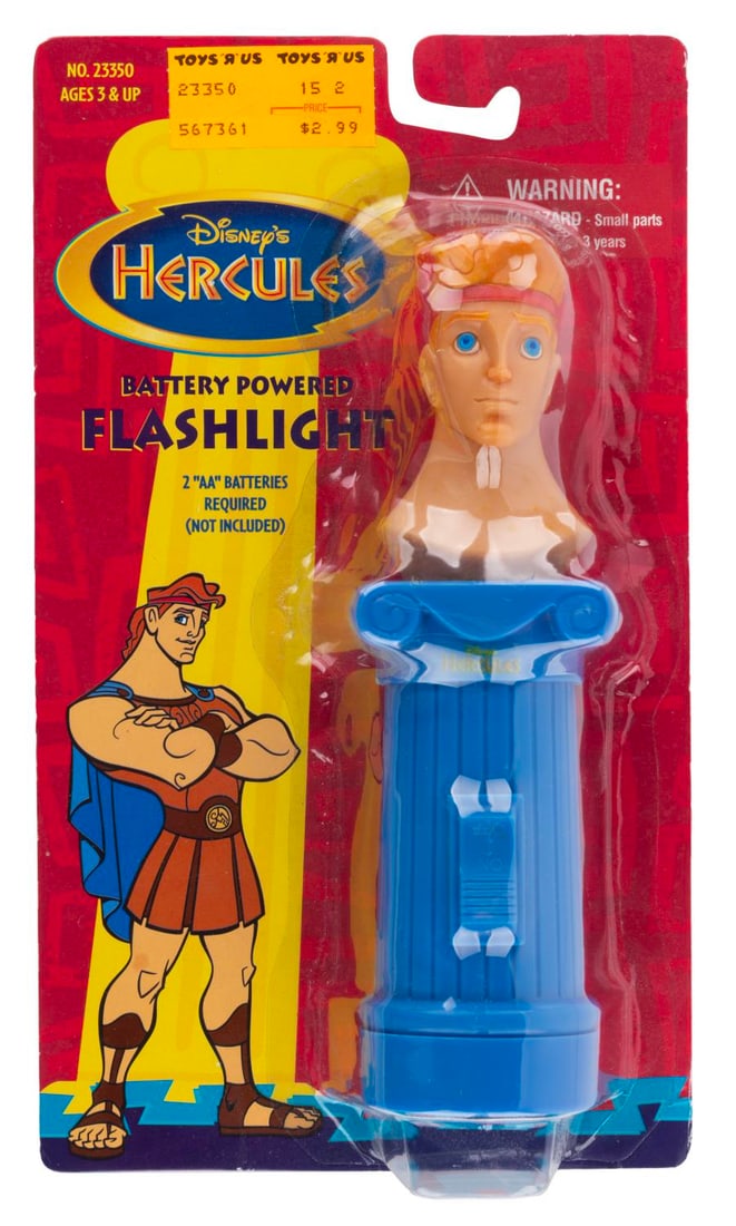 A "Hercules" Flashlight.: (Janex, 1997) A sealed figural “Hercules” flashlight manufactured by Janex. The light requires two “AA” batteries (not included) and has not been tested. Measuring 2” in